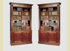 George III style open bookcases on cupboard bases